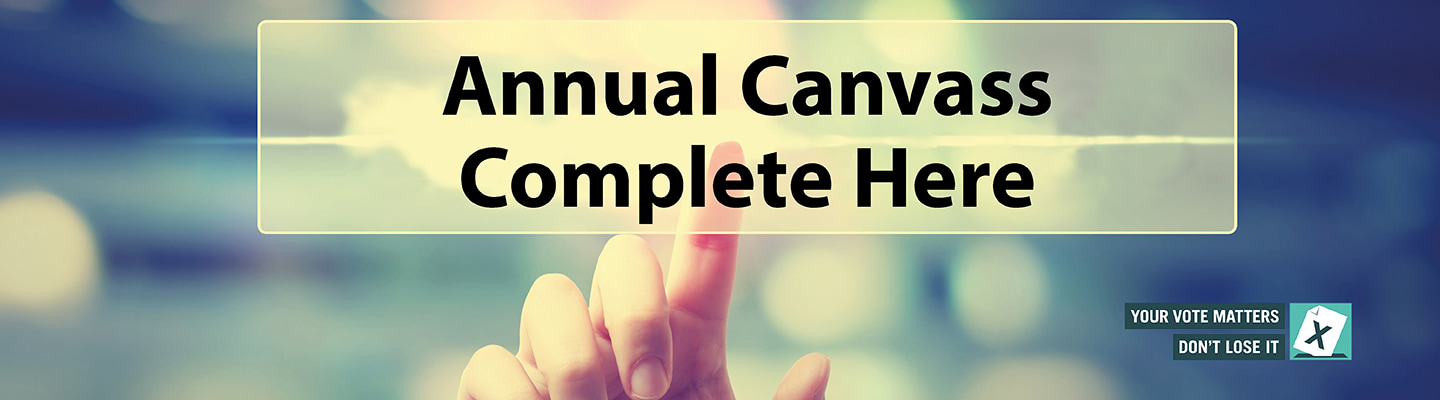 Image of finger pressing on &#039;Annual Canvass Complete Here&#039;
